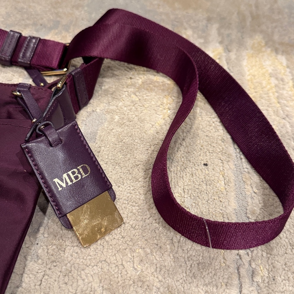 TUMI
Voyageur Capri Crossbody plum purple color in GUC - Picture 4 of 12